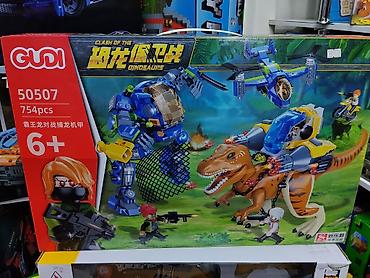 Игрушки: Конструктор GUDI «Clash of the Dinosaurs» (арт. 50507) - 754 детали - — 1