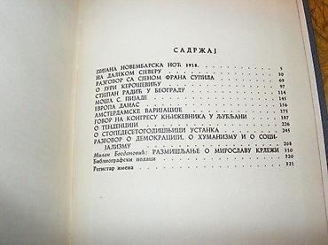 sat: Knjiga eseja Miroslav KrležaSKZ, Beograd, 1961. Tvrd povez, 333 str — 4
