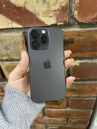 айфоню: IPhone 14 Pro, 128 ГБ, цвет «Space Black» (черный космос). Модель — 1
