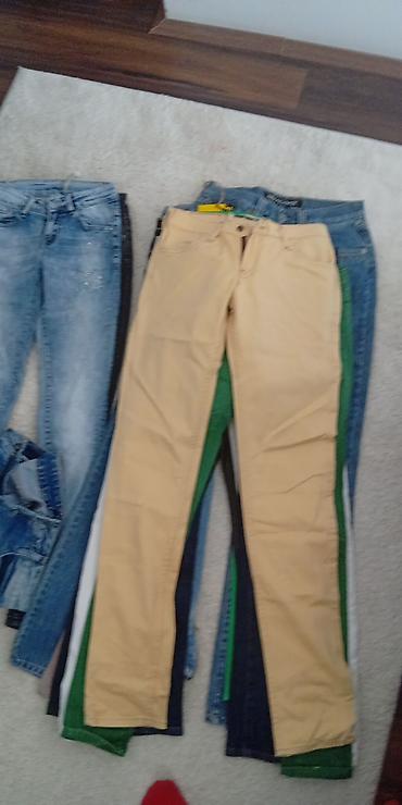 Haljine: Lot ženske odeće – pantalone/farmerke i crne koktel haljine Sadržaj — 16
