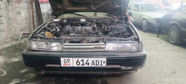 �� �� ������������������������ �������������� ��������������: Mazda 626: 1989 г., 2.2 л, Механика, Бензин, Седан