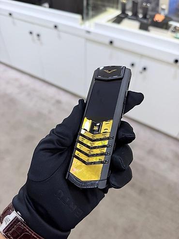 qizil nomreler: Vertu 4 GB, rəng - Qızılı, Düyməli — 9