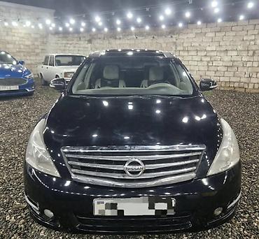 nissan wingroad: Nissan Teana – biznes sinfi sedan Xüsusiyyətlər: - Korpus: qara rəng — 1