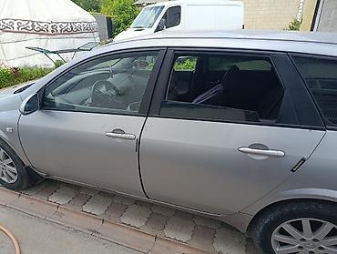 eado ev: Nissan Primera: 2010 г., Универсал — 1