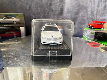 Avtomobil modelləri: Коллекционная модель BMW 750i F02 white 2008 RASTAR Scale 1:43 Art — 6