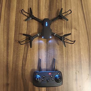 oyuncaq evlər: Qatlanan mini dron + pult dəsti Xüsusiyyətlər: - Qatlanan — 1