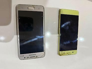 samsung s7230e wave 723: İki ədəd mobil telefon dəsti. 1) Samsung DUOS (ağ/gözəl qızılı arxa — 2