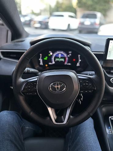 voxy noah: Toyota Corolla: 2023 г., 1.8 л, Вариатор, Гибрид, Седан — 10