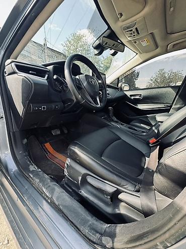 byd e1: Toyota Corolla: 2021 г., 1.8 л, Вариатор, Гибрид, Седан — 9