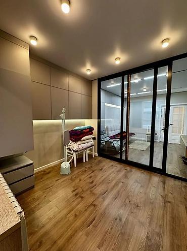 Продажа квартир: 2 комнаты, 54 м², Элитка, 1 этаж, Дизайнерский ремонт — 3