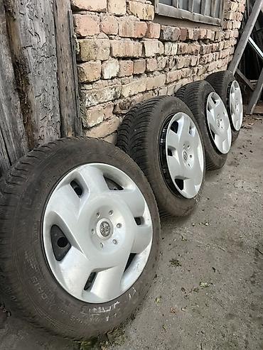ручка замок: Комплект из 4 колес в сборе: шины + штампованные диски с серебристыми — 1
