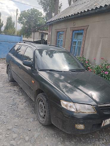 стёк: Mazda 626: 2000 г., 2 л, Механика, Бензин, Универсал — 7