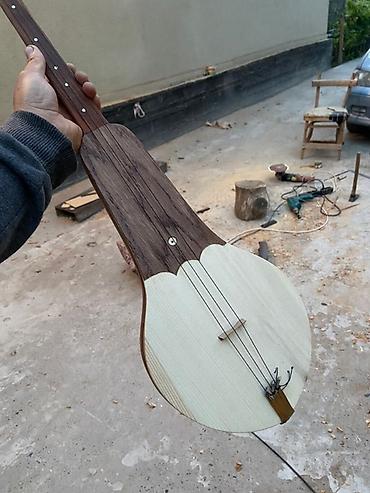 Гитары: Комуз…Өтө эмгекти мээнети талап кылган Үч кылдуу кыргыздын салттуу — 11