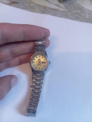 t winner: Orient avtomatik qol saatı - Brend/model: Orient Day-Date (muhtəmələn — 1