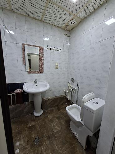 bakıda kreditle evler: 2 mərtəbəli binanın 1ci mərtəbəsi,qanuni 2 otaqlı,43kv+27kv artırma — 5