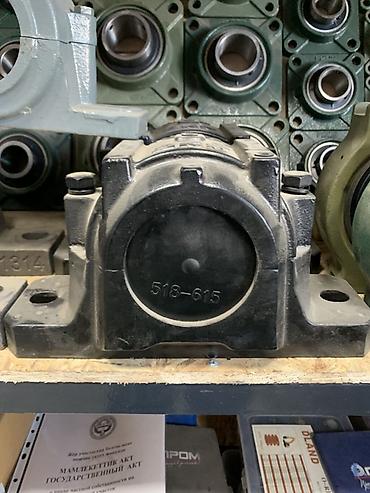 518: Корпусной подшипниковый узел SNR/SKF типа SN/SNL (разборный, на лапах) — 1