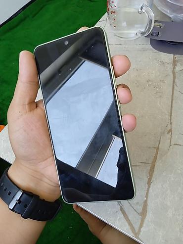 Другие мобильные телефоны: Redmi Note 13 Смартфон в мятно‑зеленом цвете с плоскими гранями и — 5