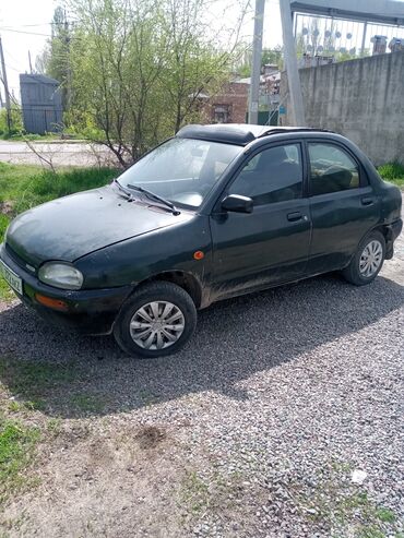 Mazda: Mazda 121: 1991 г., 1.3 л, Механика, Бензин, Седан