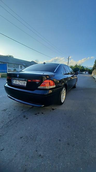 100lt hava kompresoru: BMW 7 Series (E65) – qara rəng, sedan gövdə. - Xarici: klassik BMW — 1