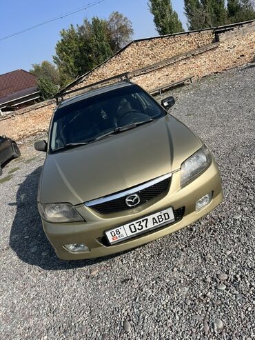 эко коврик в машину: Mazda Familia: 2003 г., 1.6 л, Механика, Бензин, Хэтчбэк