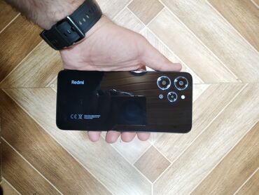 ucuz telefonlar işlənmiş: Xiaomi Redmi 12, 256 GB, rəng - Qara, 
 Barmaq izi, İki sim kartlı