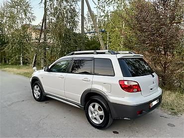 шины 14 радиус 18565: Mitsubishi Airtrek: 2004 г., 2.4 л, Автомат, Газ, Кроссовер — 10