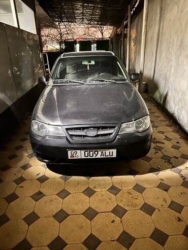 обмен на авто с доплатой: Представляем седан Daewoo Nexia, компактный автомобиль в черном цвете