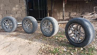 ступа: Комплект из 4 колес в сборе: литые диски + шины. 215.60.16. - — 2
