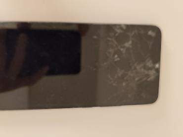 alcatel 9005x: Смартфон POCO (черный цвет). На задней панели — модуль основной камеры — 2