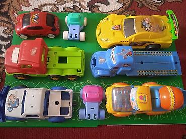 Другие игровые комплексы: Детские игрушеки транспорт и герои Состав: - Разнообразные машинки — 4
