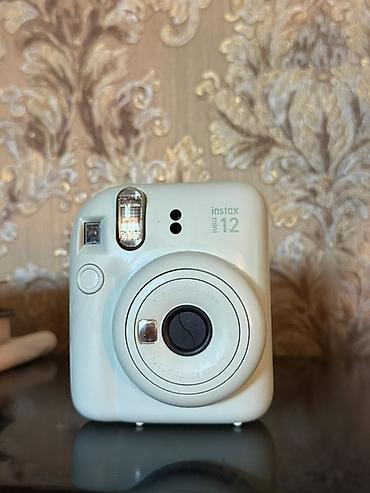 мини фото парат i: Fujifilm Instax mini 12 — компактная моментальная камера в мятном — 2