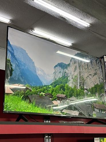 Телевизор TCL, тонкая рамка, диагональ крупного формата