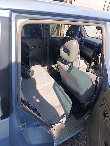 chek it: Mazda Demio: 2001 г., Автомат, Бензин, Хэтчбэк — 4
