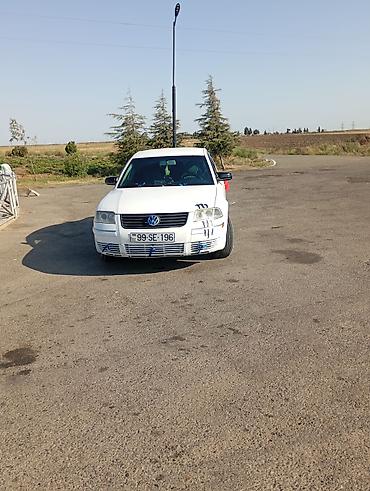 volkswagen polo v: Volkswagen Passat (B5) sedan – ağ rəngli, 4 qapı, önlü-arxalı geniş — 2