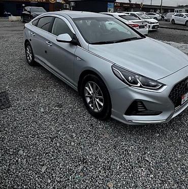 rental car: Сдаётся в аренду седан Hyundai Sonata серебристого цвета. Автомобиль — 2