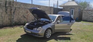 qizil uzuk: Mercedes-Benz 320: 3.2 l | 2004 il Sedan