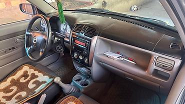 mini ev: Mazda Demio: 2000 г., 1.5 л, Механика, Бензин, Хэтчбэк — 5