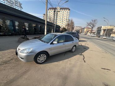 Mitsubishi: Mitsubishi lancer 2005 год, объем 1,6. механика, левый руль. Пробег