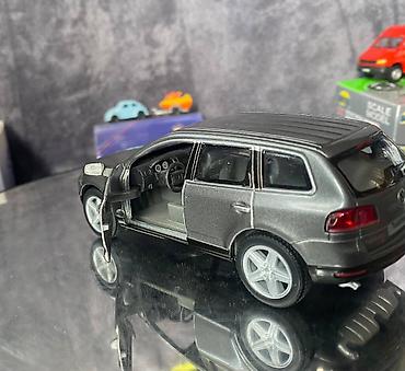 Avtomobil modelləri: Коллекционная модель volkswagen touareg grey metallic 2003 kinsmart — 15