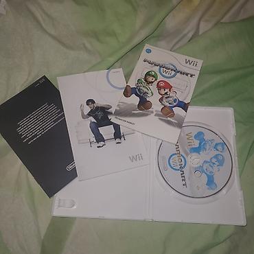 disqler: Mario Kart Wii – orijinal Nintendo Wii oyunu (PAL versiyası) Məzmun — 2