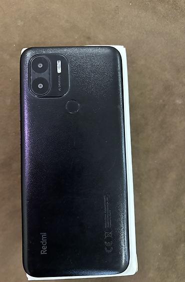 m50 qara: Redmi A1+ – smartfon - Ekran: 6.52" HD+ böyük displey, damcı tipli — 2