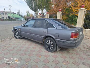 продажа авто каракол: Mazda 626: 1990 г., 2 л, Механика, Бензин, Хэтчбэк