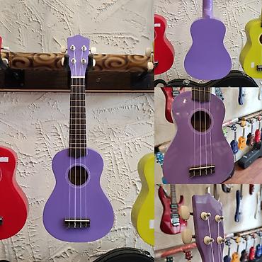 ukulele: Ukulele Smiger GK11 Simlərin sayı: 4 Çanta hədiyyə Ölçü:Soprano — 1