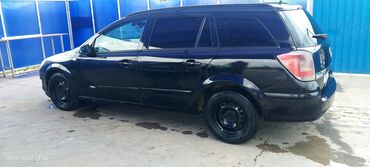 Opel: Opel Astra H Caravan (universal) –1.3 dizel Xüsusiyyətlər: - Kuzov — 10