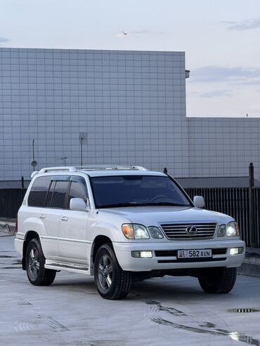 шины на lx570: Полноразмерный внедорожник Lexus LX 470 белого цвета, оснащенный