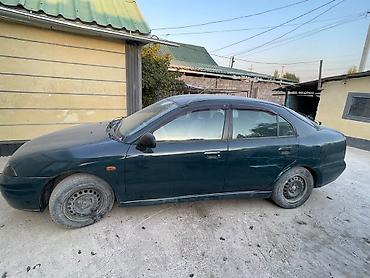 панель камри 35: Mitsubishi Carisma: 1997 г., 1.8 л, Автомат, Бензин, Седан — 9