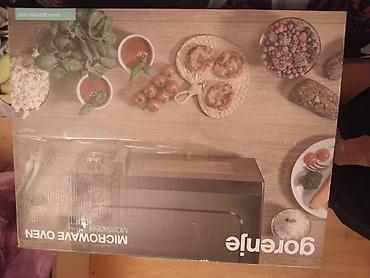 Mikrodalğalı sobalar: Mikrodalğalı soba Gorenje, Ayrıca dayanan, Mikrodalğalar ilə, rəng - Qara, Yeni — 1