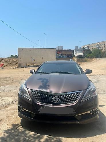 grandeur disk: Hyundai Grandeur: 2 l | 2014 il Sedan — 6