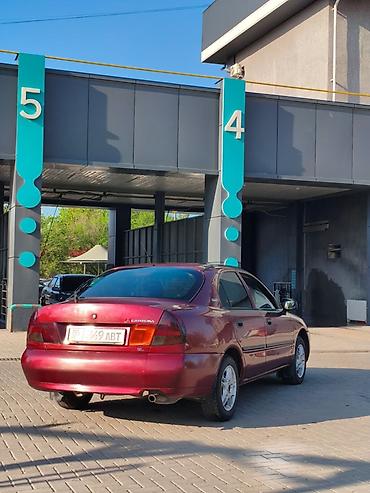 нексия сиденья: Mitsubishi Carisma: 1998 г., Седан — 4