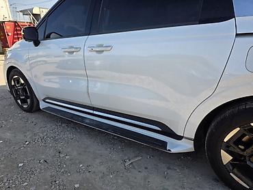 Kia: Kia Carnival: 2022 г., Минивэн — 24